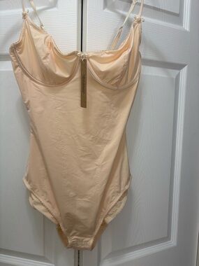 Skim’s cream color Bodysuit